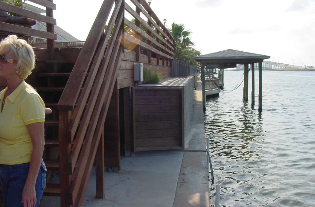 EXISTING WOOD DECK, CONCRETE STEPS and FLATWORK, HANDRAILS, BULKHEAD, STAIRS and POOL to be REPLACED